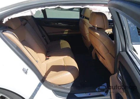 2015 BMW 750 Lxi из США, поврежденный, VIN WBAYF8C54FD655171
